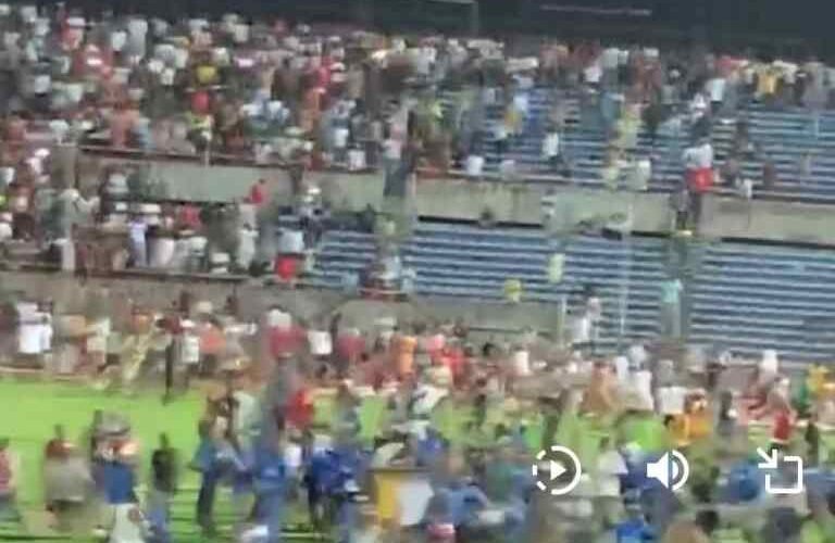 Pandemonium As Fans Invade Pitch After Referee Awards Late Penalty To Rangers Against Enyimba