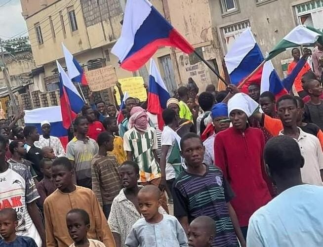 Protesters Storm Streets With Russian Flags In Kano