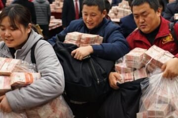 Chinese Boss Drops $26 Million In Cash At End Of Year Party, Tells Employees To Take As Much As They Can Carry