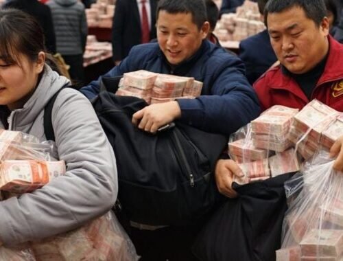 Chinese Boss Drops $26 Million In Cash At End Of Year Party, Tells Employees To Take As Much As They Can Carry