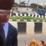 Tony Elumelu Spotted Buying Roasted Corn From Roadside Vendor
